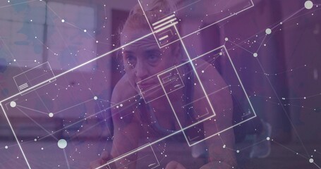 Holding forearm plank woman wearing sports bra, leggings on exercise mat in gym, with AR overlay