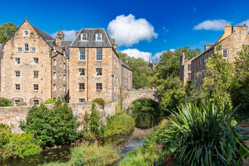 Peaceful view of Dean Village, Scotland. A historic Edinburgh neighborhood, beautiful oasis by the Water of Leith. It once served as working mills. Gorgeous and picturesque. 