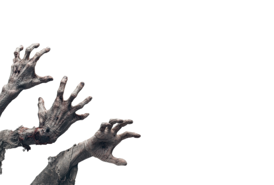 Zombie hands reaching from black background