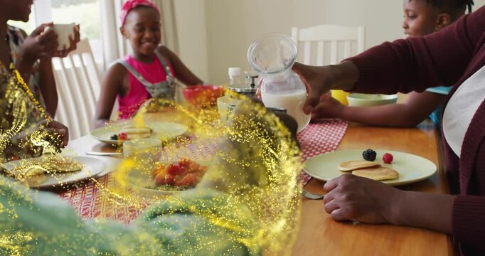 Mother pouring milk into mug family breakfast food marketing, golden magic swirling around table