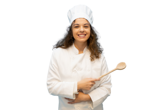 Young female chef in a crisp white uniform, smiling brightly while holding a wooden spoon against a transparent background