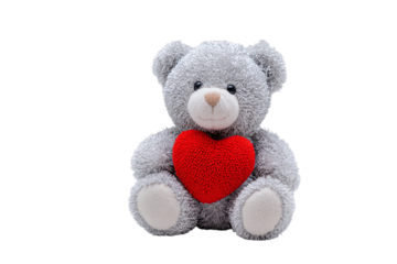 a teddy bear holding a red heart