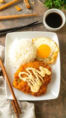 Fried fish, rice, and egg plate