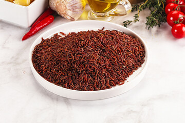 Red raw dry rice gor cooking