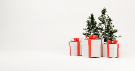 White gift boxes with red ribbon and pine trees