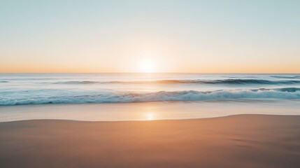 Minimalist beach sunrise with golden sky and calm waves, wide sandy foreground offering clean natural space for creative advertising background, product display or inspirational text overlay.