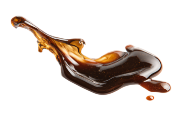 a liquid pouring from a bottle into a glass