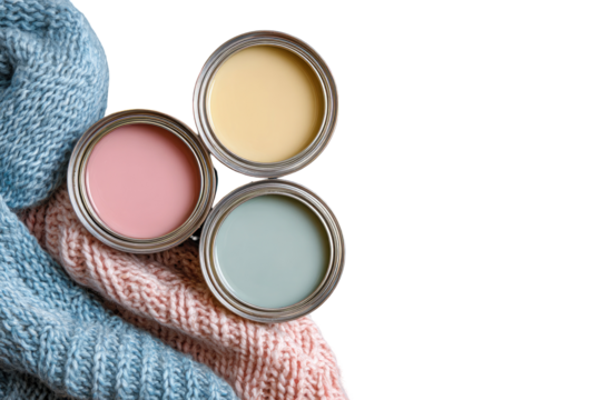 Three paint cans, pastel colors, on knitted fabric - Powered by Adobe