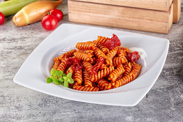 Italian fusilli pasta with tomatoes