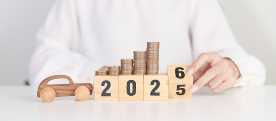 2025 end year to Happy New Year 2026 with car model and Coins Money stack for deposit and Automobile Tax. Money Saving, Car Insurance, Financial, vehicle Repair and Maintenance and New Year concept