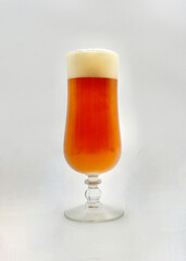 A pale ale in an elegant glass.
