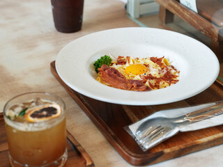 Classic Homemade Pasta Carbonara Italian. Spaghetti with bacon, eggs, parsel and parmesan cheese. Pasta Carbonara on white plate