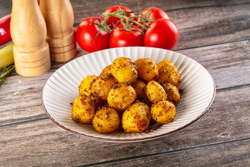 Baked small baby potato with herbs