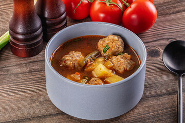 Tomato Soup with meatballs and vegetables