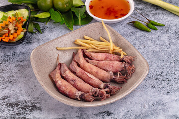 Boiled wild mini calamari snack