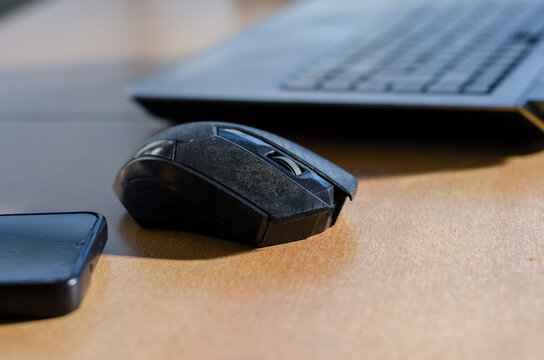 Portrait office objects. Mouse phone laptop.