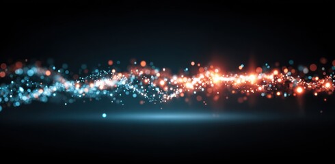 An abstract design features an undulating horizontal line of glowing orange and blue particles against a black background, creating a sense of movement