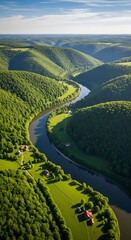 A breathtaking aerial view of a winding river carving through lush green valleys, showcasing idyllic rural landscapes and charming houses nestled amongst the trees.