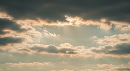Dramatic Cloudy Sky with Golden Sunlight Breaking Through the Clouds