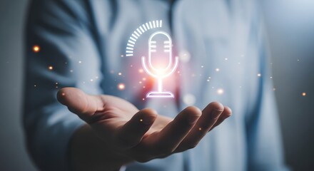 A person's hand cradles a glowing microphone icon, representing audio recording.