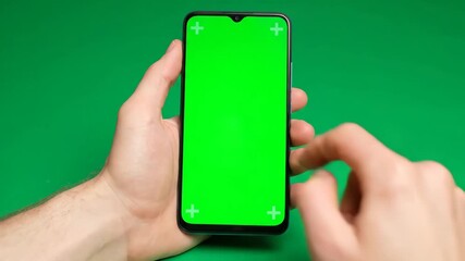 Smartphone with Green Screen Mockup on Green Background - Powered by Adobe