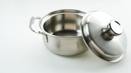 Stainless steel cooking pot on white background