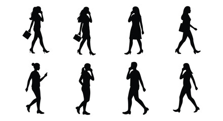 Silhouette of Women Walking and Talking on Cell Phones