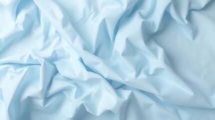 Obraz premium Close up of crumpled light blue fabric texture background
