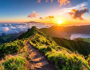 Green hillside path winds toward a sunset over a lake & a misty mountain; clouds dot the sky in warm light