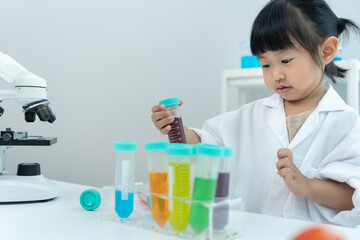 Fototapeta premium Children Scientist education scientific in laboratory. Medical child learning, Biotechnology, discover, imagine, executive function, kid, education, intelligence quotient, emotional quotient