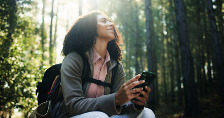 Hiking, thinking and woman with phone in forest for direction search, travel break and map guide....