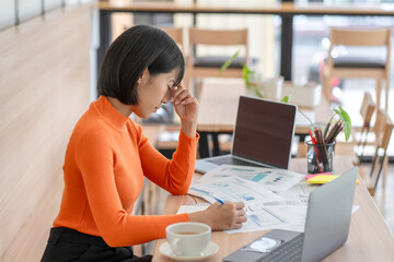 Woking woman with stressed and worried about working mistake and problems