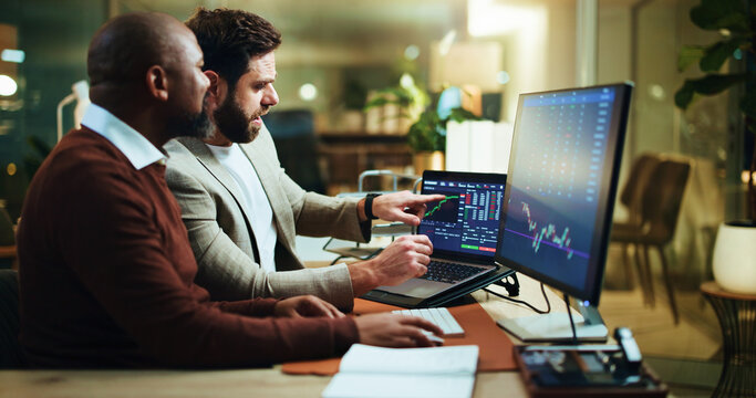 Teamwork, stock market and laptop screen with business people in office for trading, night and graph. Broker, partnership and investment chart with employees for account growth and overtime