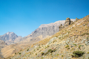 The scenic view of Reşko summit in the Sat (Cilo) mountains, Serpel and Horgedim plateau with its glaciers and glacier rivers in Hakkari, Turkey.
