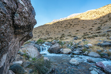 The scenic view of Reşko summit in the Sat (Cilo) mountains, Serpel and Horgedim plateau with its glaciers and glacier rivers in Hakkari, Turkey.