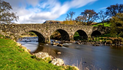 Stone arch bridge over a river