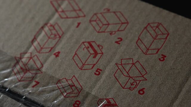 A printable step-by-step instruction on how to properly fold a box by hand.
A folded cardboard box in a warehouse.
Freight forwarding and logistics.
Export and import of goods