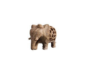 Stone-made decorative pieces of elephant with carefully carved designs over the body.  Single-stone made with a baby elephant inside.  Mostly sold in Mahabalipuram, the famous tourist place of India.