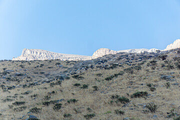 The scenic view of Reşko summit in the Sat (Cilo) mountains, Serpel and Horgedim plateau with its glaciers and glacier rivers in Hakkari, Turkey.