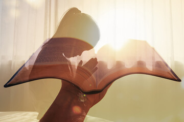 Little girl praying in bed before sleep	