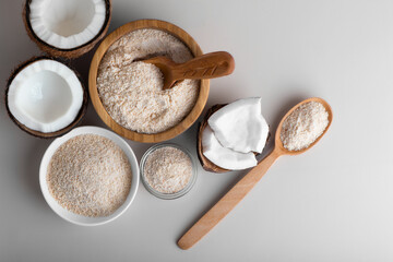 Organic coconut flour isolated on background, healthy gluten-free baking ingredient, natural tropical flour. 