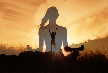 Silhouetted woman sits meditating in a peaceful landscape at sunset, image of an empowered person...