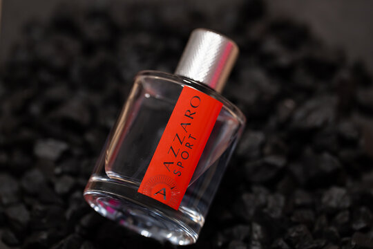 Bucharest Romania 16 September 2025.Azzaro Sport perfume bottle displayed on a black stone background. Luxury fragrance product photo highlighting elegance, freshness, and modern masculine style ideea