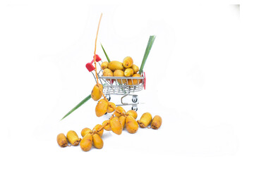 golden dates on white bacground, Date palm fresh ripe yellow fruits (Phoenix Dactylifera) on the clusters in organic fruit garden for harvesting bag