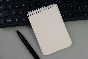 blank paper next to school tools with no word as a template for text space concept. business and education concept