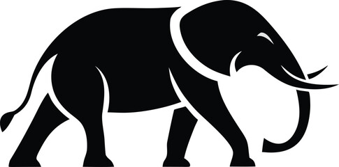 Silhouette of a majestic elephant walking with tusks and trunk raised gracefully © Shibly