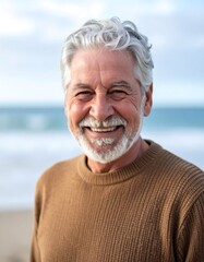 Smiling senior man on beach