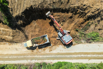 Excavator Loading a Truck