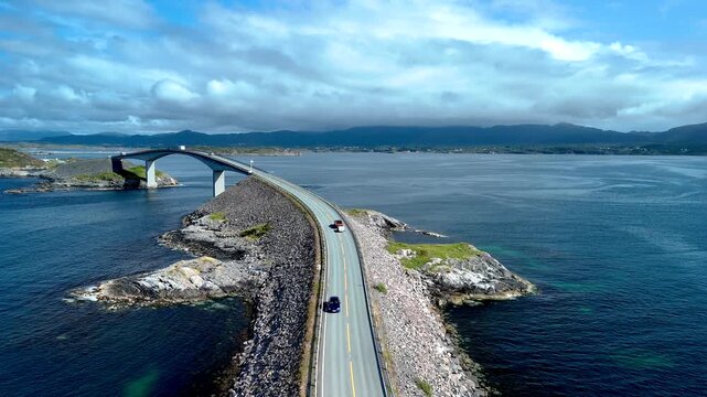 Experience the majestic beauty of Norways Atlantic Ocean Road, featuring dramatic coastal landscapes and serene waters. A perfect destination for nature enthusiasts and road trip lovers alike.