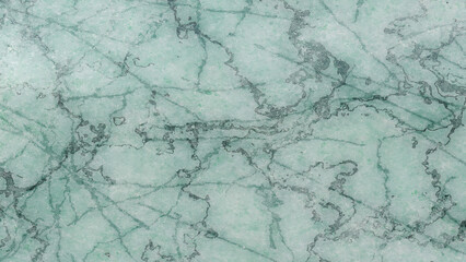 Obraz premium Elegant green marble texture featuring swirling veins for backgrounds and design elements in natural stone aesthetics